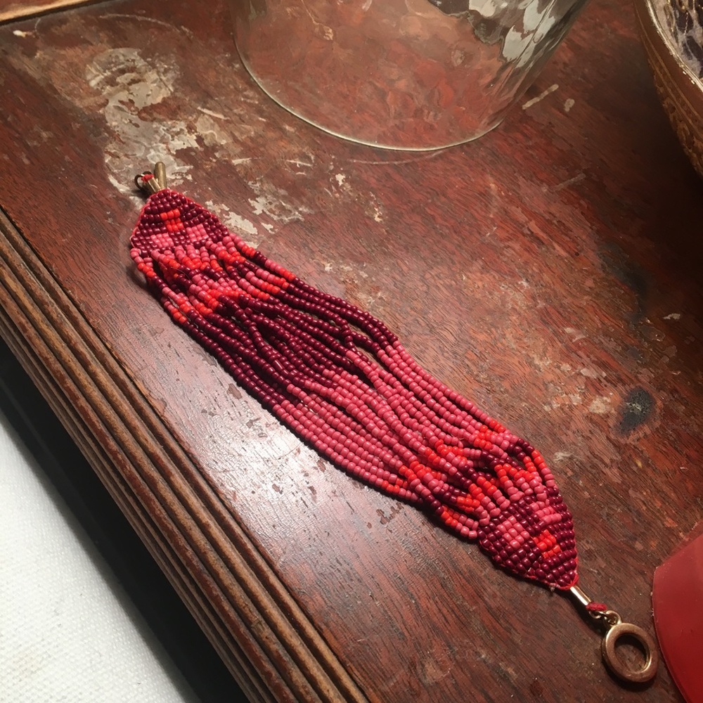 Red and pink beaded bracelet